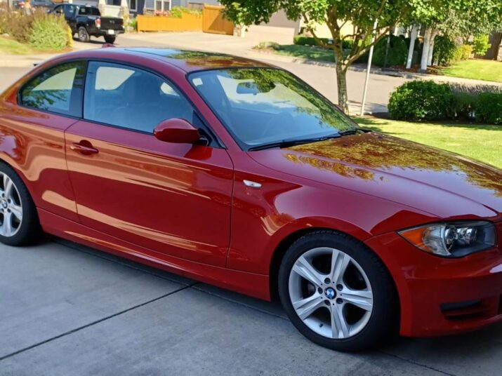 2009 BMW 128i Coupe with 64k miles and a 6-Speed Manual