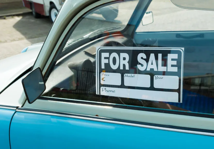 for sale sign in car window