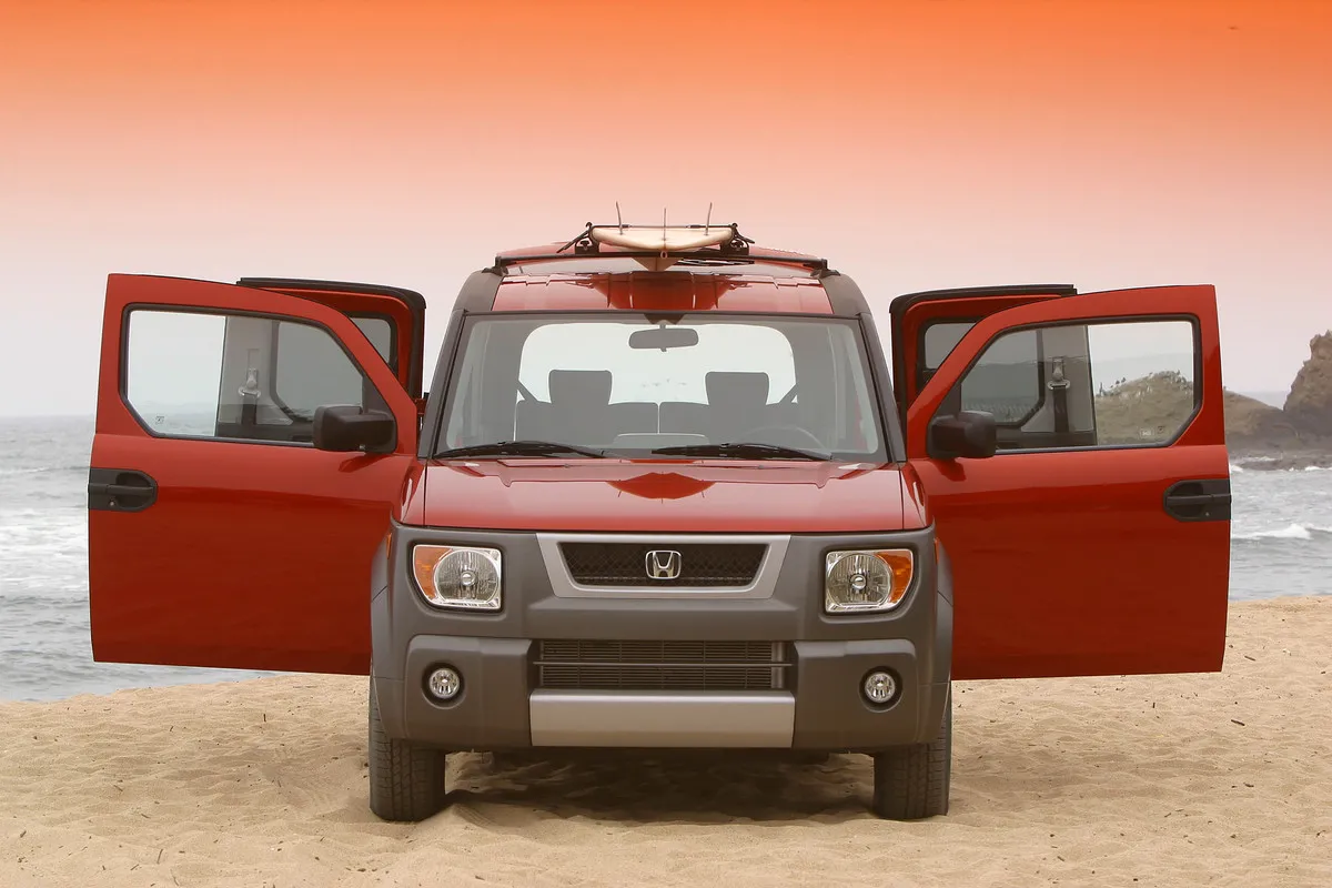 2003 Honda Element with surfboard on roof